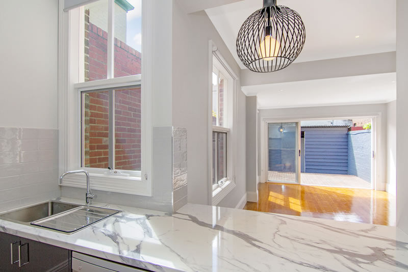 Kitchen with Marble benchtops, lookout outside